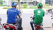 Thành lập Hội đồng xử lý vụ vi phạm giữa GrabTaxi và Uber Việt Nam