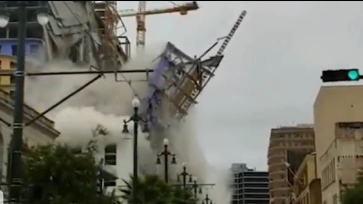 Cận cảnh tòa nhà 18 tầng bất ngờ đổ sập xuống đường