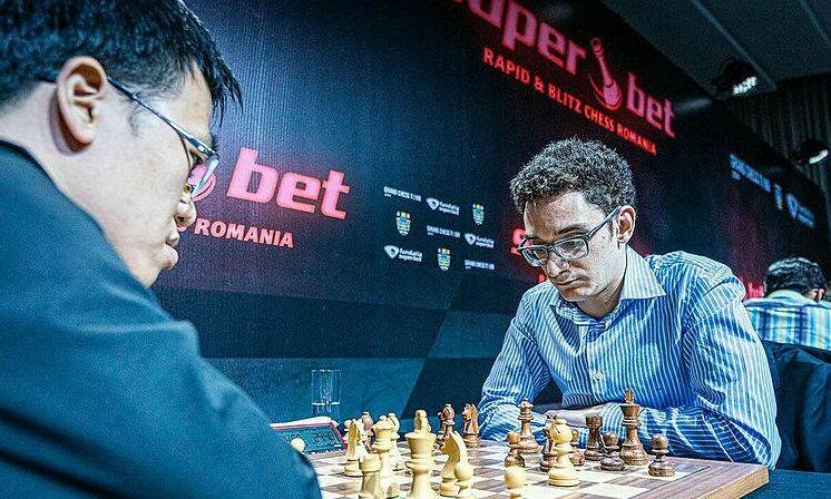 Quang Liêm thua Caruana vì đòn thí hậu dọa chiếu hết