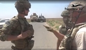 Lính Nga điều xe bọc thép bao vây lính Mỹ ở Syria
