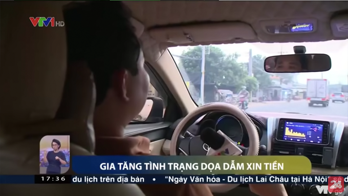 Gõ cửa xe rồi dọa dẫm xin đểu tài xế tại TP HCM