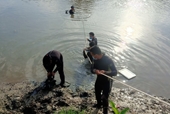 Hai thanh niên bơi qua sông bắt cá, một người đuối nước tử vong