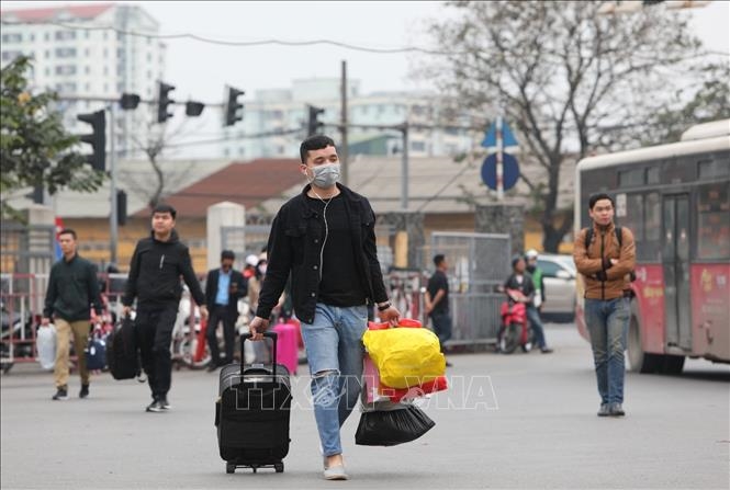 Người dân ở “vùng đỏ” về quê ăn Tết có phải cách ly y tế