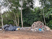 Bắt quả tang 2 tài xế đổ hàng tấn chất thải ra môi trường