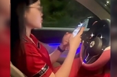 Xử phạt nữ tài xế lái xe Mercedes buông hai tay và dùng điện thoại
