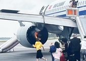 Động cơ máy bay bốc cháy khi hạ cánh, hành khách sơ tán khẩn cấp