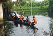 Lặn tìm một cô gái nghi mất tích dưới kênh Tham Lương