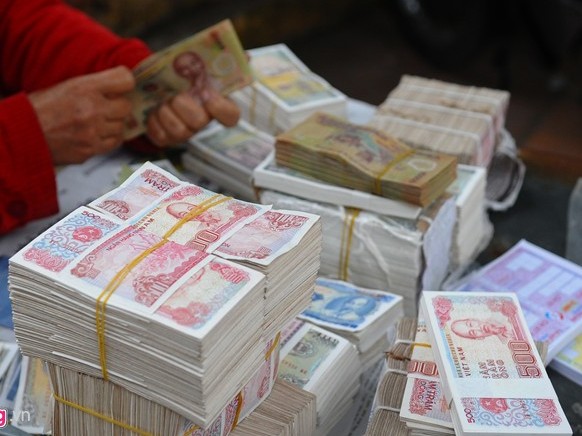 Đổi tiền mới lì xì Mất 1 triệu được 800 ngàn