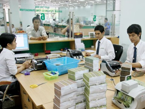 Chính sách tiền tệ năm 2014 Giữ giá VNĐ, kéo mặt bằng lãi suất