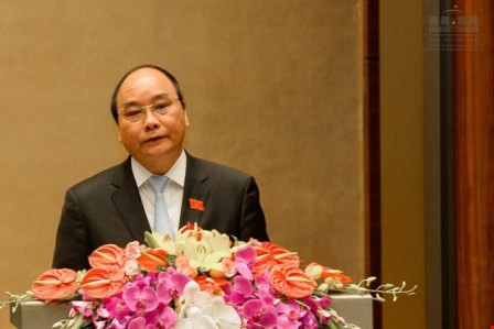  Phó Thủ tướng Nguyễn Xuân Phúc phát biểu trong phiên họp QH sáng 21-3.