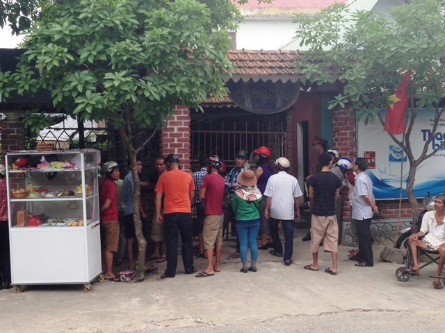 Nghi can tẩm xăng đốt phụ nữ đã ra tự thú