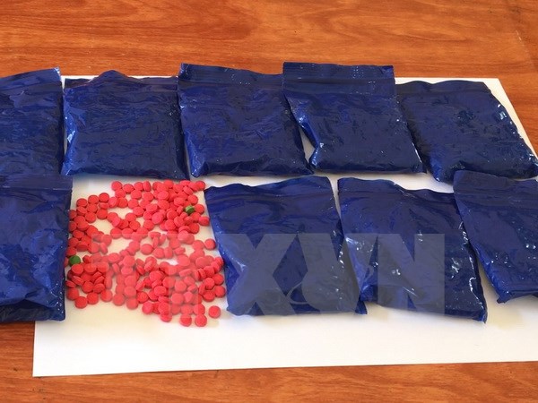 Bắt 2 đối tượng vận chuyển 20 bánh heroin và hơn 2 000 viên ma túy