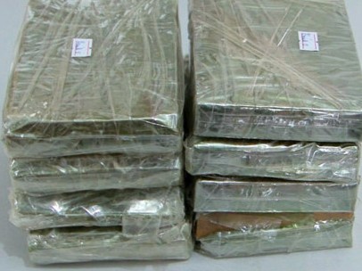 Bắt trưởng thôn vận chuyển 8 bánh heroin